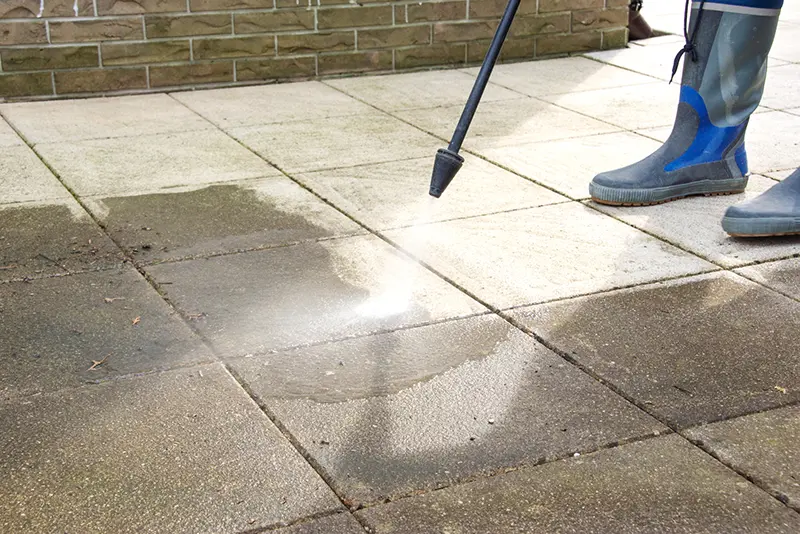 Picture of pressure washing a sidewalk in North East Florida